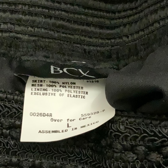 Bcx black mini skirt. Full shape with elastic waistband. Size L - Picture 4 of 4